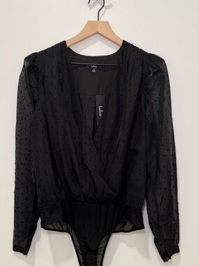 Lulu's Black Sheer Swiss Dot Surplice Bodysuit with Puff Shoulders